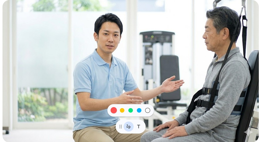 歩行補助具を装着した男性に身振り手振りで説明をする理学療法士