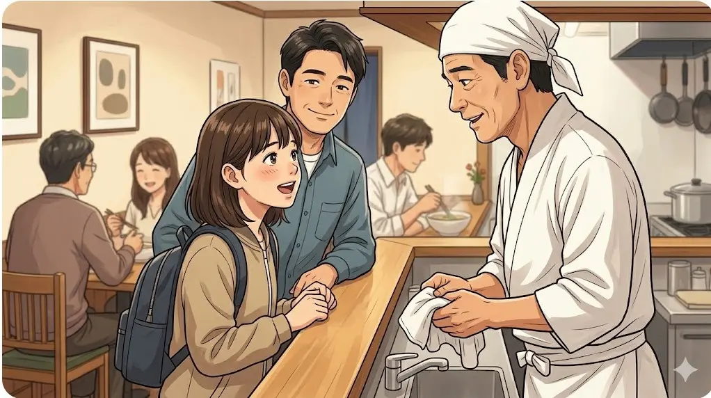 麺ジャラスKのカウンター越しに店主の川田利明さんと笑顔で会話する13歳の女の子